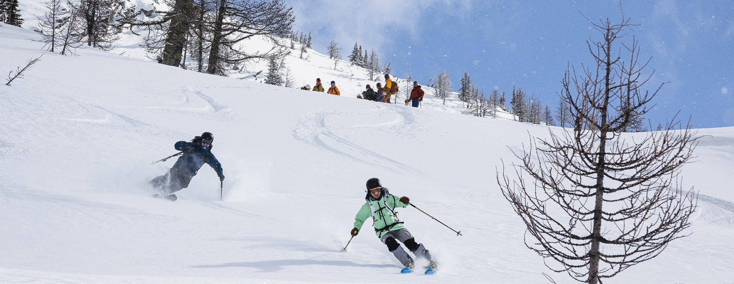 group of skiers on a crowded slope