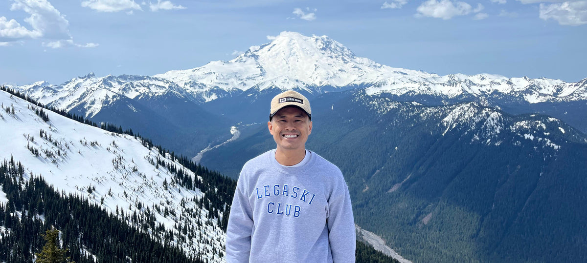 Greg Louie, The Ski PT in front of a mountain view