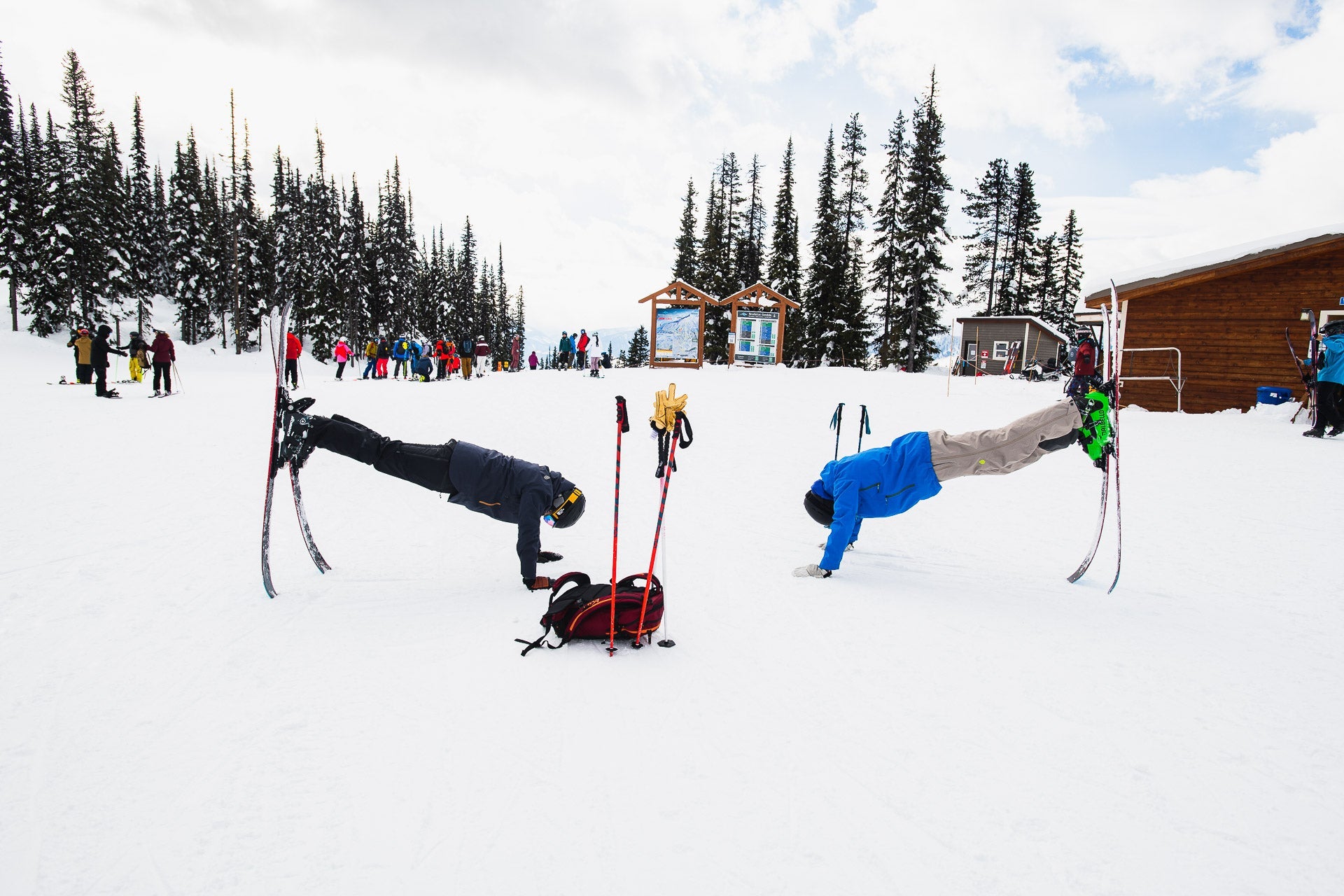 Skiers doing handstands on Renoun Skis